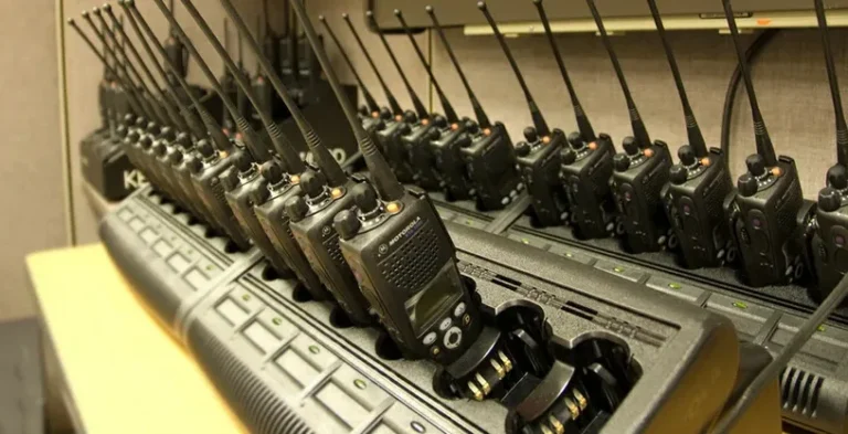 Motorola radios organized in charging bases for operation preparation